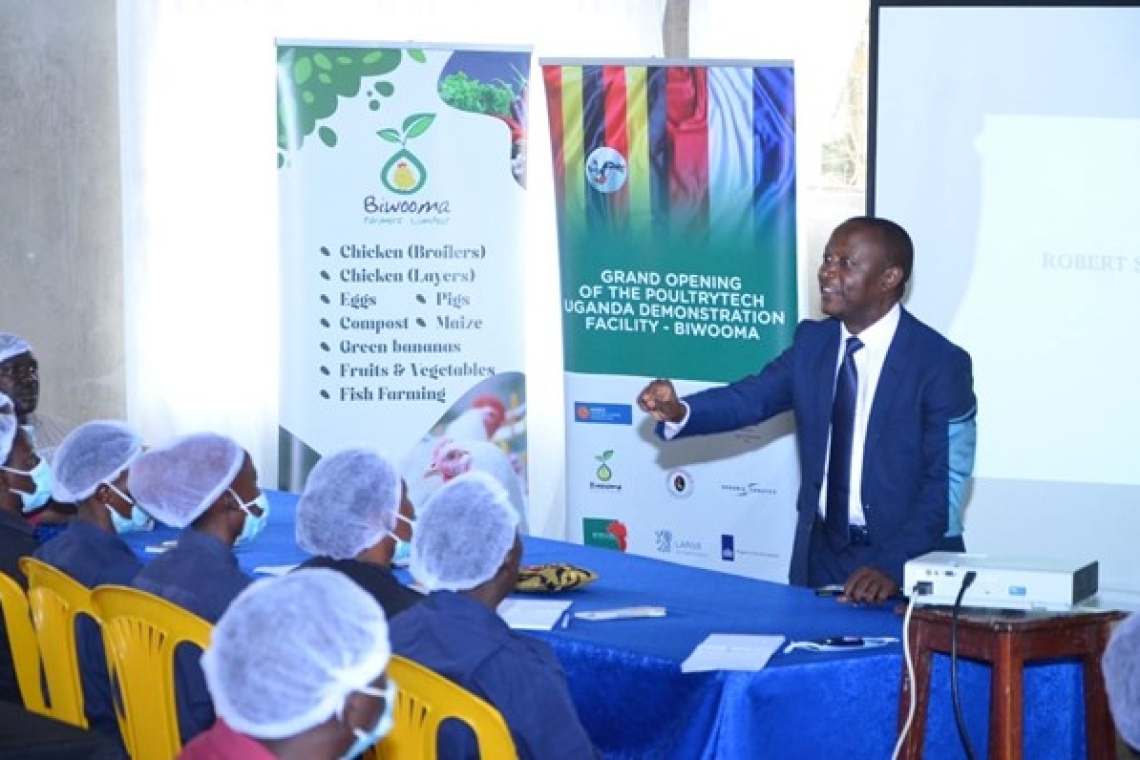 Oweek. Serwanga teaching the youth about self-employment Image
